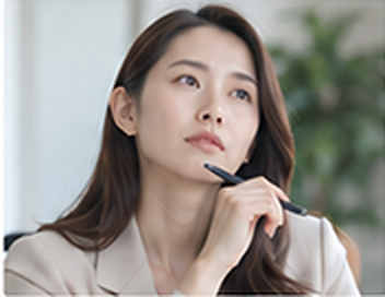 試験対策やコーチングについて考える女性